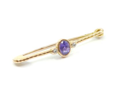 
BROCHE en or jaune 14kt, 585° en forme d'épingle...