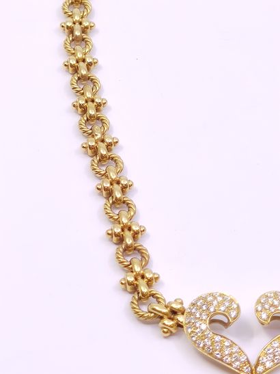 COLLIER en or jaune 750° ornée d'un pendentif...