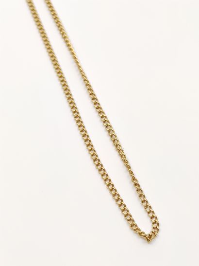 
CHAINE en or jaune 750° et bracelet gourmette...