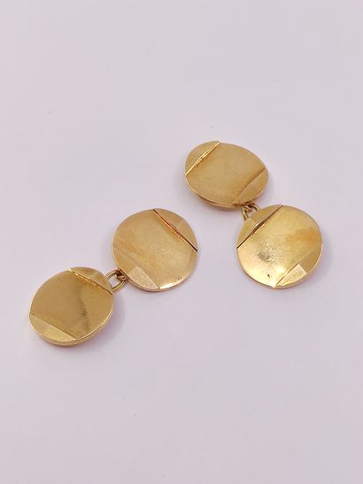 PAIRE de boutons de manchette en or jaune...