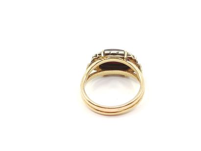 BAGUE en or jaune 750° et argent sertie d'un...
