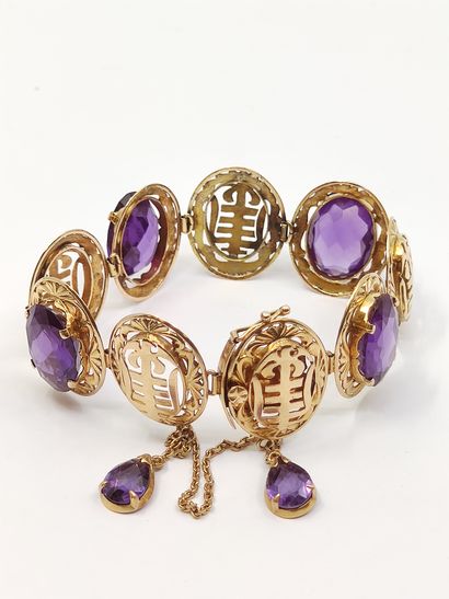 
Bracelet en or 750 ornée de pierres violettes...