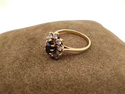
BAGUE marguerite en or jaune 750° ornée...