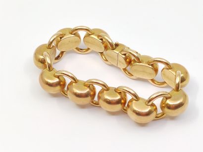 BRACELET en or jaune 750° à maille boules...