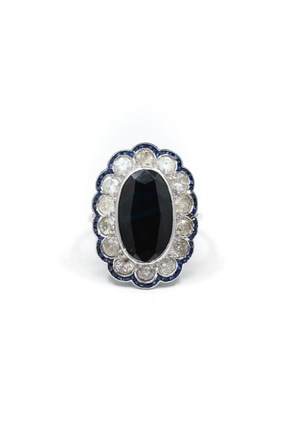 BAGUE pompadour ornée de saphir en serti...