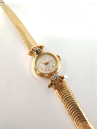 LIP 

Montre bracelet en or jaune 750°, boîtier...