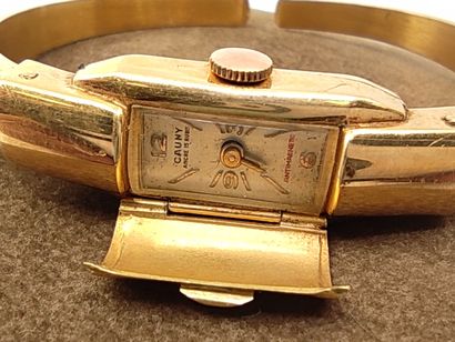 CAUNY

Montre bracelet jonc en or jaune 750°...