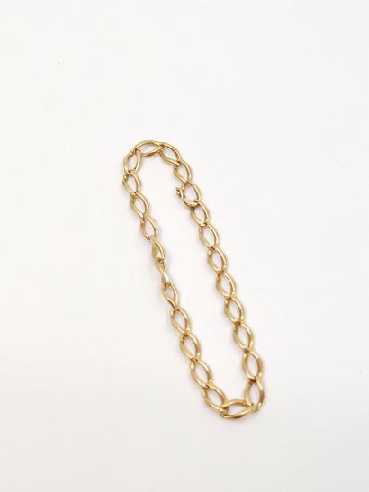 
CHAINE en or jaune 750° et bracelet gourmette...