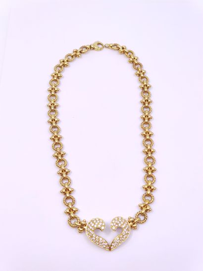 COLLIER en or jaune 750° ornée d'un pendentif...