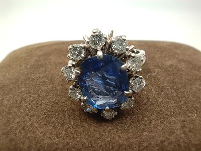 BAGUE marguerite en or gris 750° et platine...
