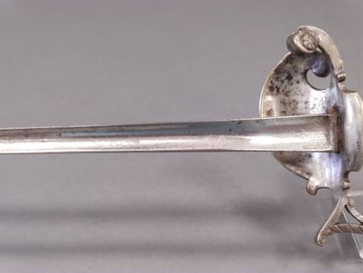 Officer's sword. 

Blackened wood handle...