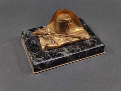 Two souvenirs : 

A paperweight with the...