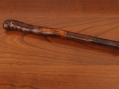 Two sword sticks: one modern and one made...