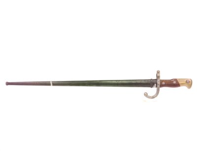 Gras bayonet model 1874. 

A.B.E. Scabbard...