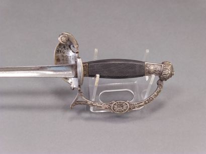 Officer's sword. 

Blackened wood handle...