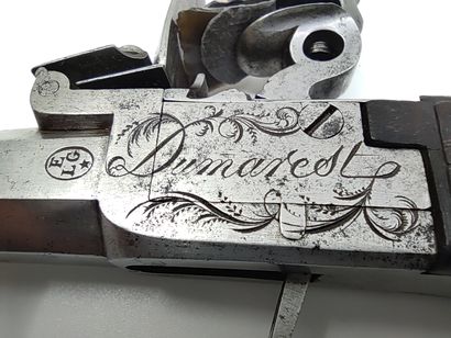 Flintlock box pistol by Dumarest. 

Barrel...