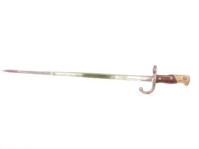 Gras bayonet model 1874. 

A.B.E. Scabbard...
