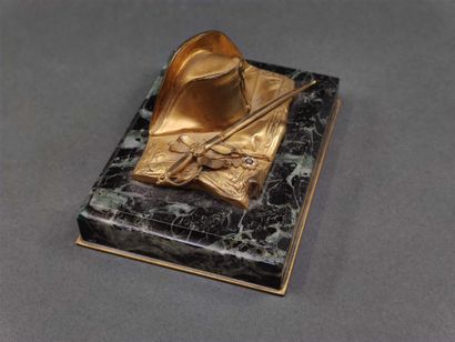 Two souvenirs : 

A paperweight with the...