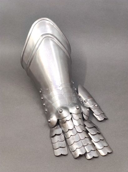 Armour gauntlet. 

Iron, with articulated...