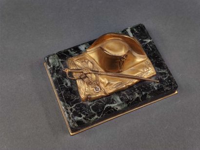 Two souvenirs : 

A paperweight with the...