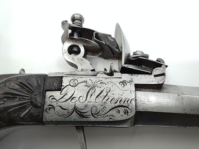 Flintlock box pistol by Dumarest. 

Barrel...