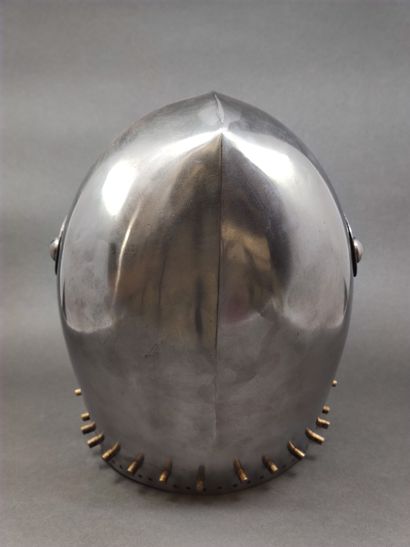 Medieval style armour. 

Iron and brass,...