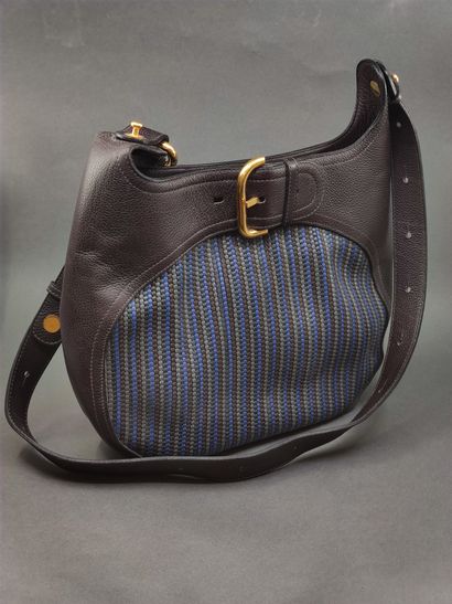 DELVAUX

Sac à main en cuir prune et tréssé...