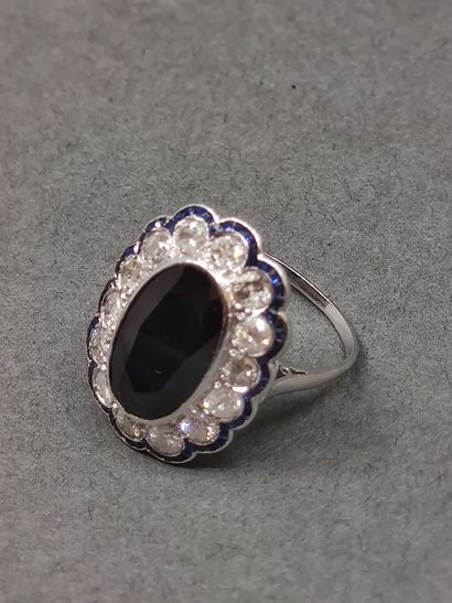 
BAGUE pompadour ornée de saphir en serti...