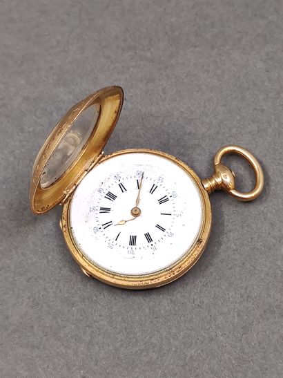 MONTRE de col en or jaune 750° 

Poinçon...