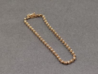 BRACELET rivière en or jaune 750° ornée de...