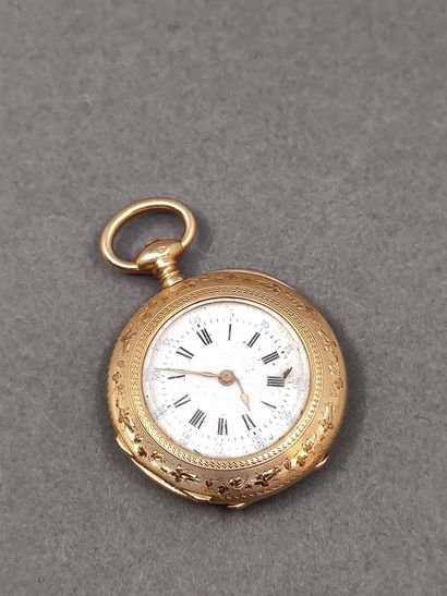 MONTRE de col en or jaune 750° 

Poinçon...