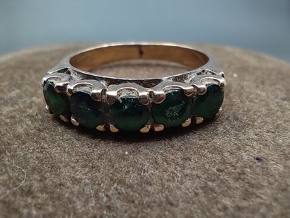 BAGUE jarretière en or rose 750° ornée de...