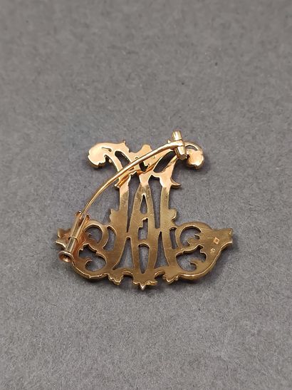 TRAVAIL Français 

Broche en or jaune 750°...