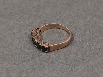 BAGUE jarretière en or rose 750° ornée de...