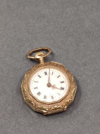 MONTRE de col en or jaune et vert, finement...