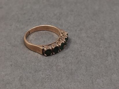 BAGUE jarretière en or rose 750° ornée de...