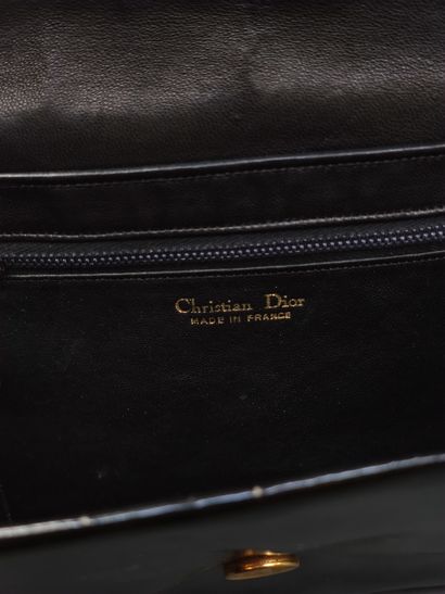 
DIOR 




Patent leather clutch bag




In...