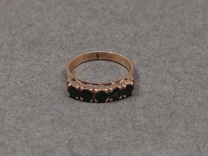 BAGUE jarretière en or rose 750° ornée de...