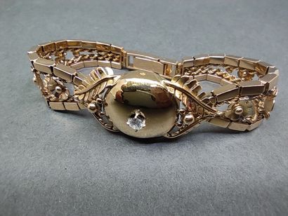BRACELET en or jaune 750° orné d'un diamant...