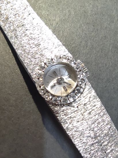 BUCHERER

Montre bracelet en or gris 750°...