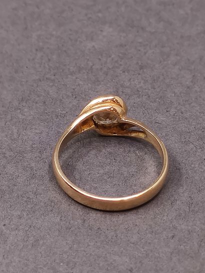 
BAGUE en or jaune 750° ornée d'un diamant...