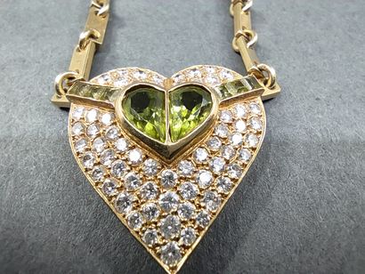 COLLIER

En or jaune 750 en forme de cœur,...