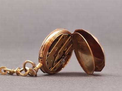 
CHATELAINE en or jaune 750 et son coulant...
