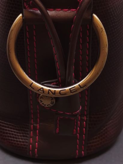 LANCEL 

SAC en cuir marron surpiques rose...