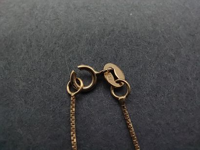 COLLIER en or jaune 750° accompagnée d'un...