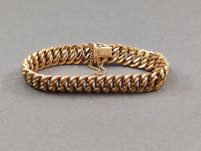 BRACELET maille américaine en or jaune 750°...