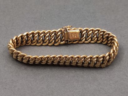 BRACELET maille américaine en or jaune 750°...