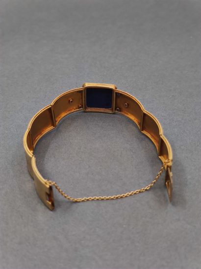 
Bracelet jonc articulé en or jaune 750 orné...