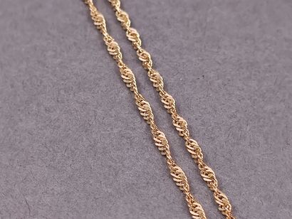 CHAINE en or jaune 750° ornée d'un pendentif...