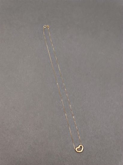 COLLIER en or jaune 750° accompagnée d'un...